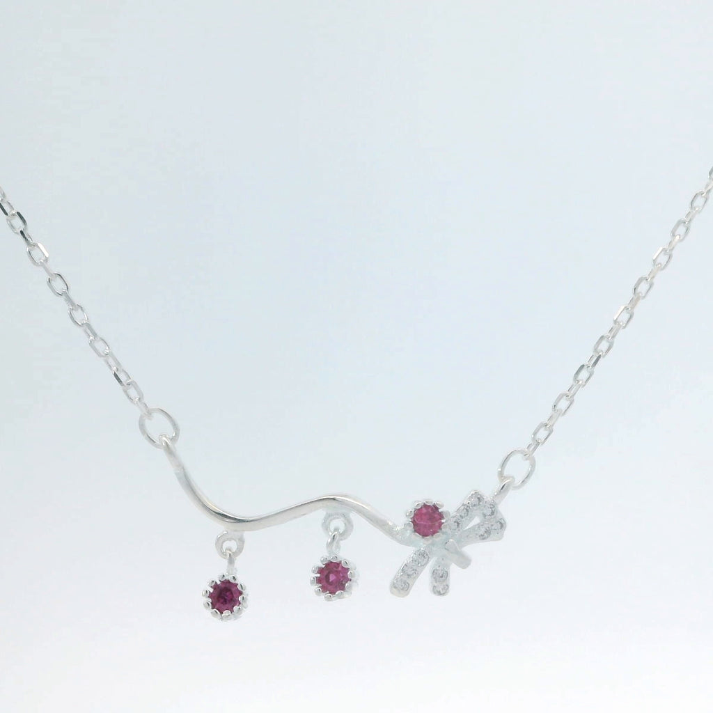 Elegant Silver Necklace with Ruby Accents