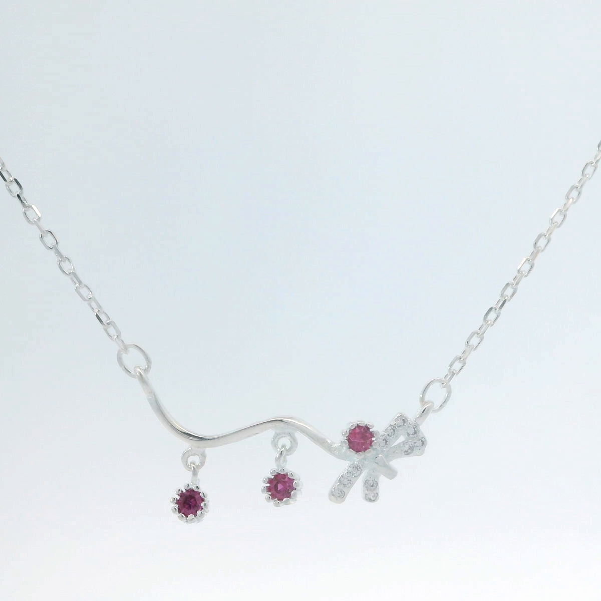 Elegant Silver Necklace with Ruby Accents