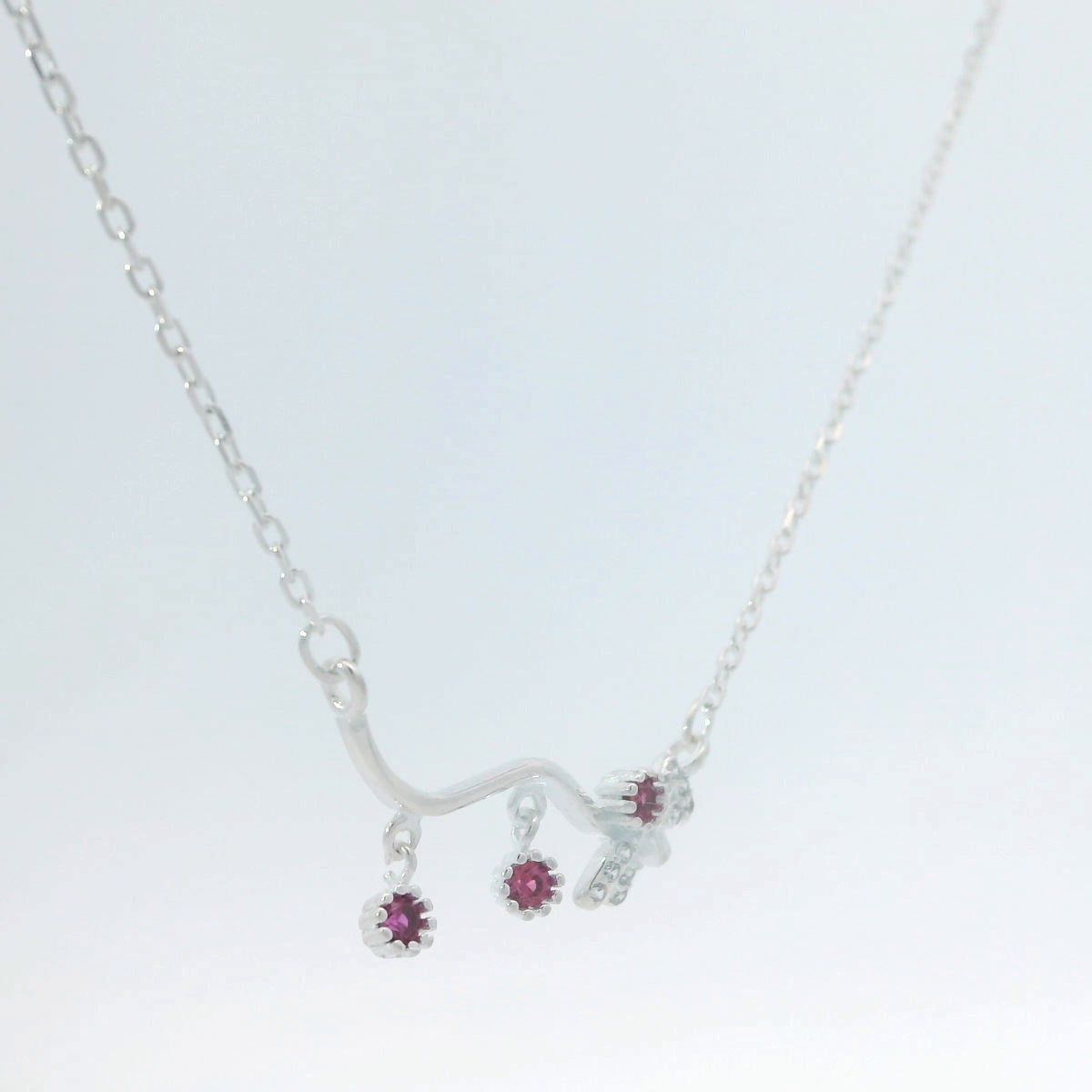 Elegant Silver Necklace with Ruby Accents