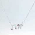 Elegant Silver Necklace with Ruby Accents