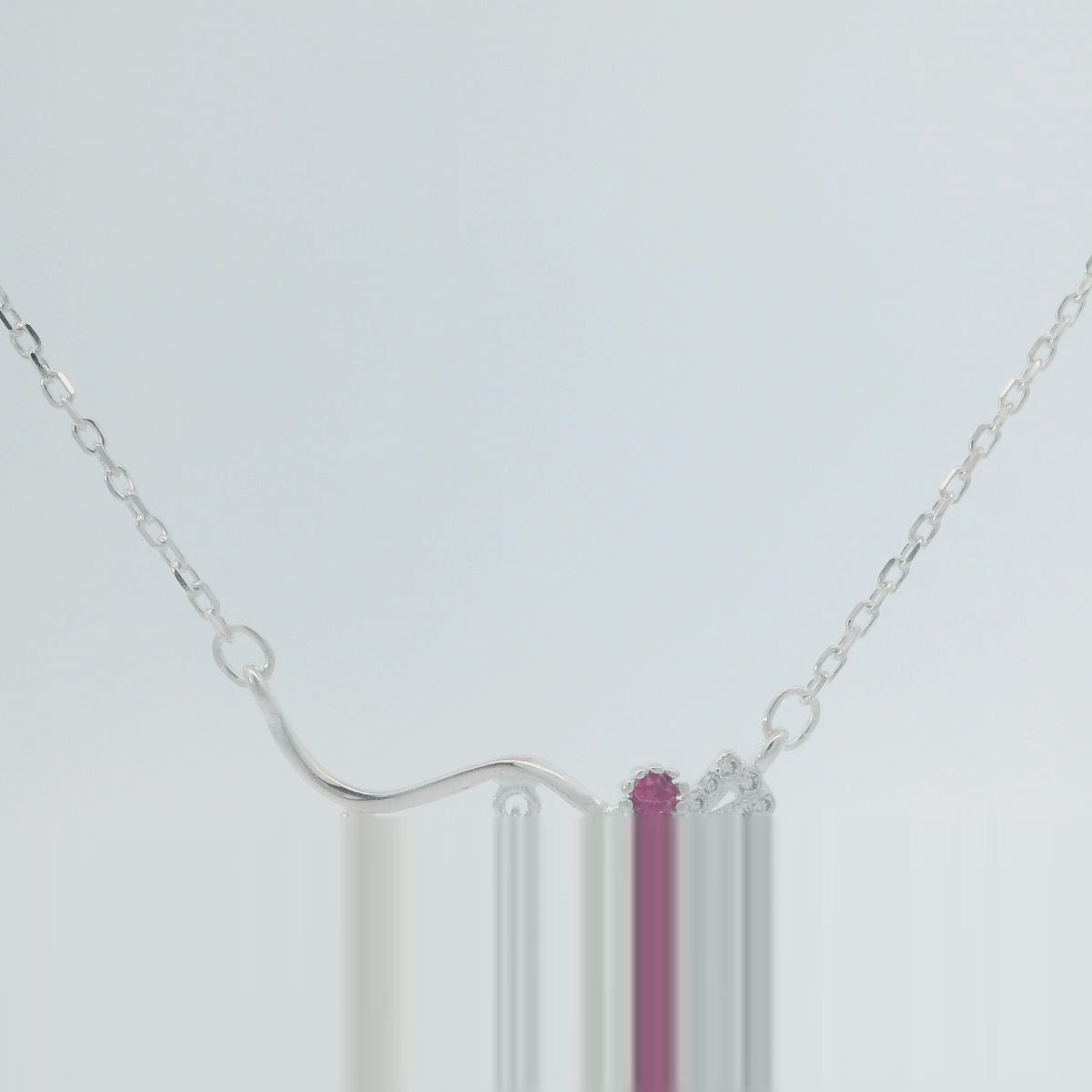 Elegant Silver Necklace with Ruby Accents